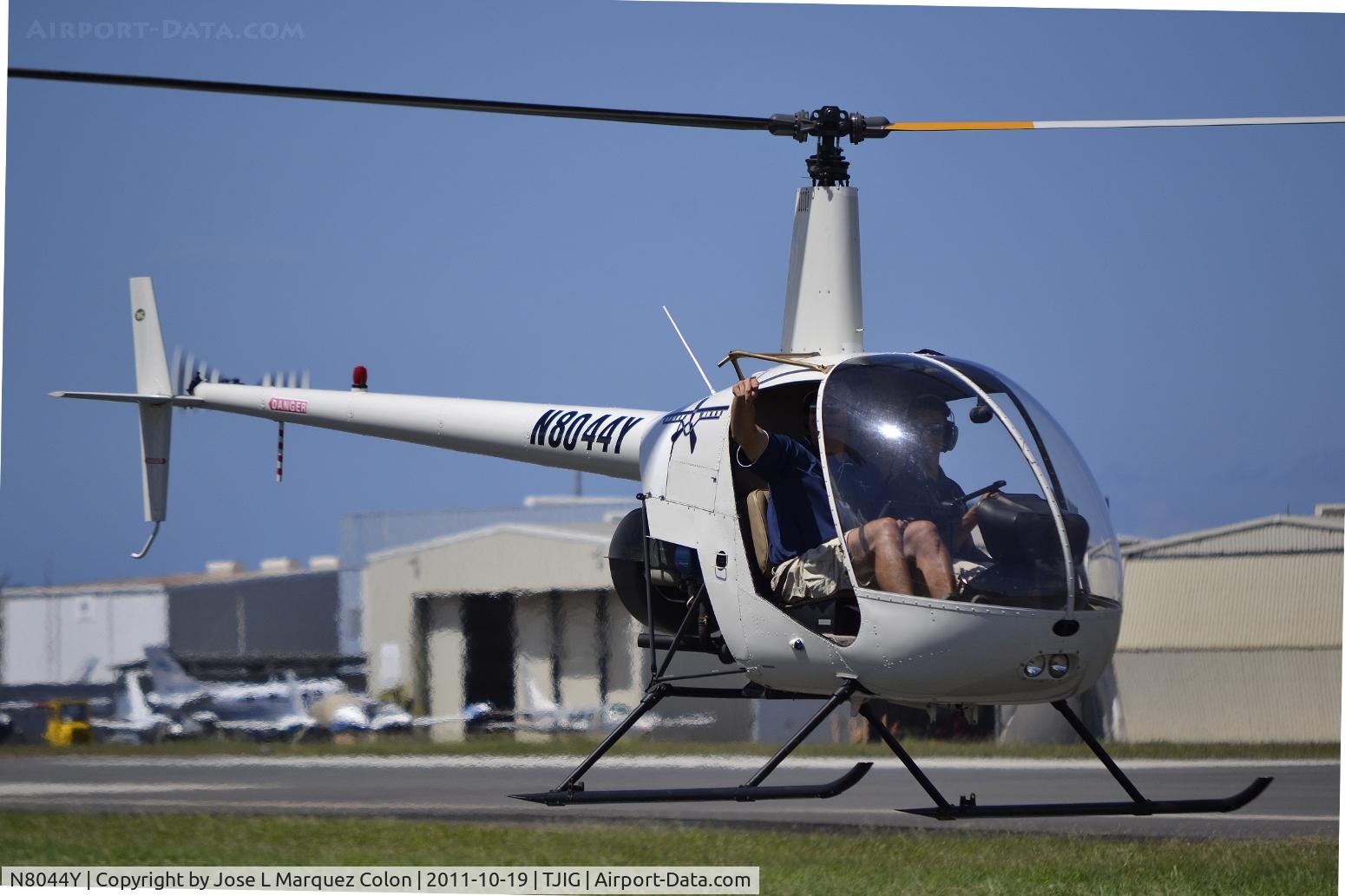 N8044Y, 1989 Robinson R22 BETA C/N 1138, Taxiing via bravo taxi way to the terminal of the airport.