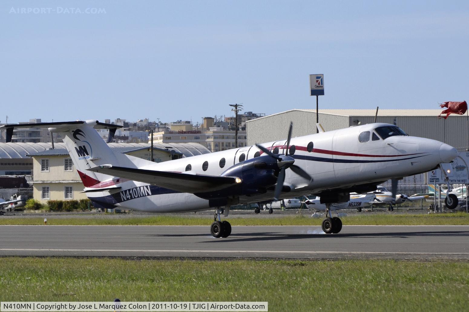 N410MN, 1991 Beech 1900C C/N UC-167, Practice landings at TJIG airport.