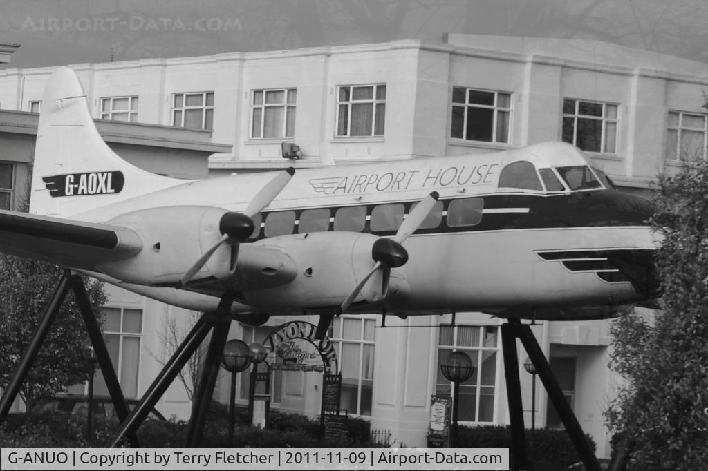 G-ANUO, 1954 De Havilland DH-114 Heron 2D C/N 14062, This airframe sits at the front of the  Terminal building at the old Croydon Airport that closed in 1959 - the airframe was recovered from Biggin Hill and restored in the colours and marks G-AOXL of Morton Air Services to represent the last scheduled flig