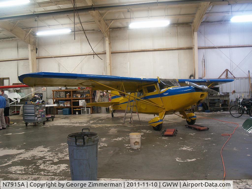 N7915A, 1953 Taylorcraft 15A C/N 5-14005, In Woods Aviation Mainentance Hanger @ Goldsboro-Wayne Executive Jetport for Fuel Pump repair.