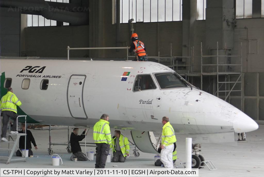 CS-TPH, 1997 Embraer EMB-145EP (ERJ-145EP) C/N 145017, Being prepped for spray in Air Livery hanger.