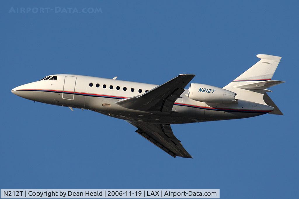 N212T, Dassault Falcon 2000 C/N 052, AT&T Corporation's 1997 Dassault Falcon 2000 N212T climbing out from RWY 25R.