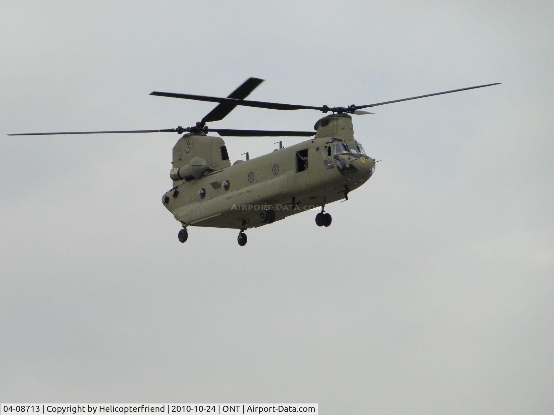 04-08713, 2004 Boeing CH-47F Chinook C/N M.8713, Parked at Guardian Air parking area. Departed southbound and then turned eastbound