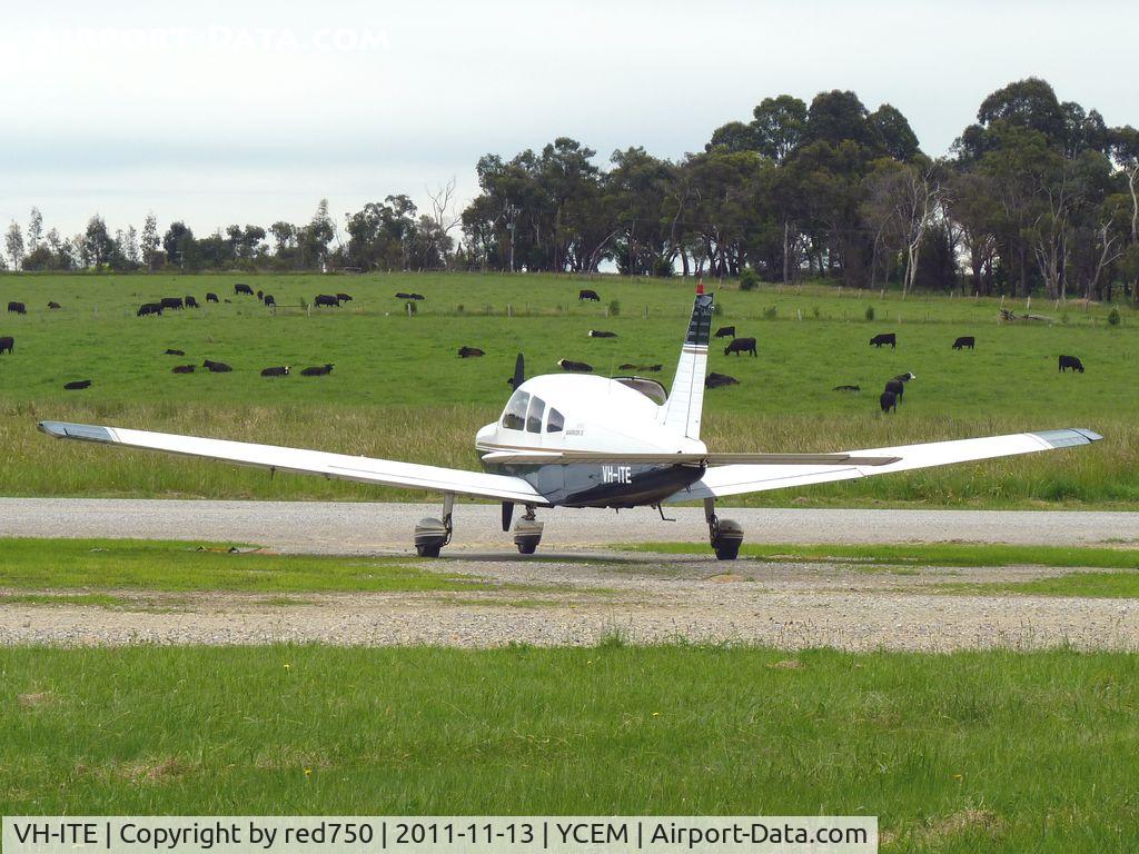 VH-ITE, 1977 Piper PA-28-161 C/N 28-7716072, Piper Warrior VH-ITH at Coldstream. To emphasise the rural nature of Coldstream Airport, note the cattle on the hill in the background.