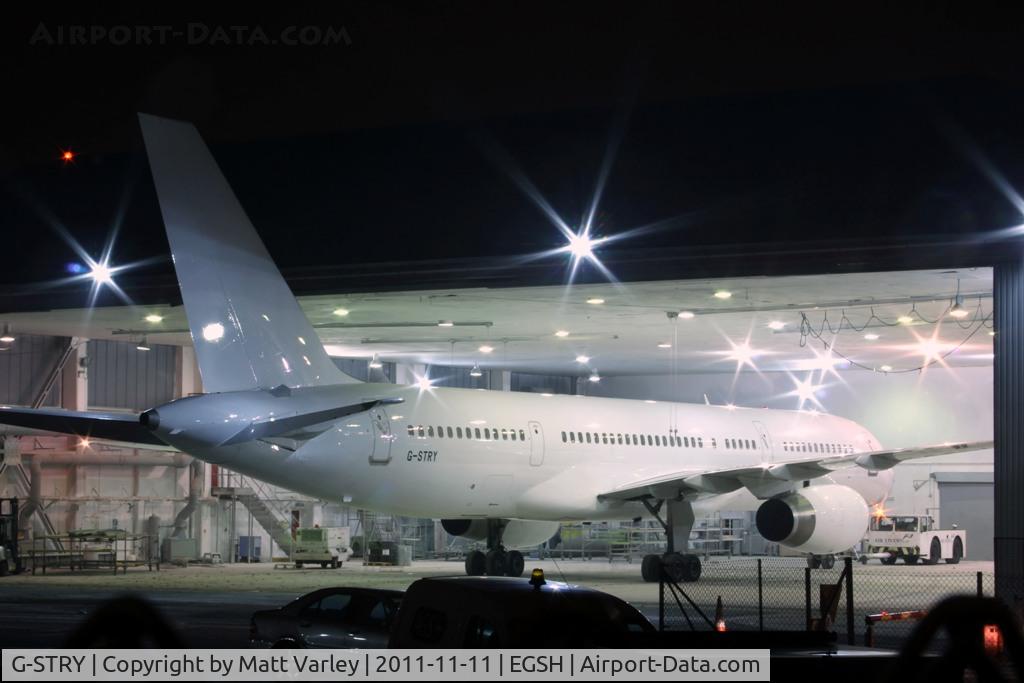 G-STRY, 1996 Boeing 757-28A C/N 28161, Sat in Air Livery hanger 2 after spray into an all white C/S.