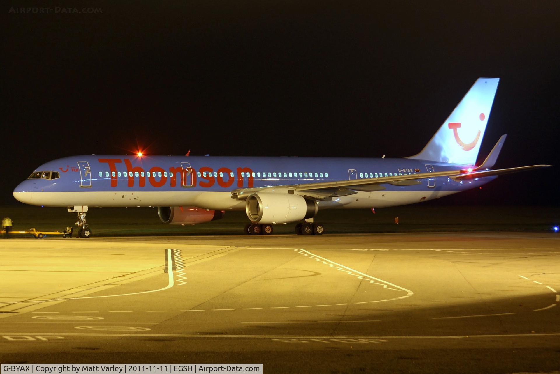 G-BYAX, 1999 Boeing 757-204 C/N 28834, Freshly sprayed, Being un-hooked after push back from stand 6.