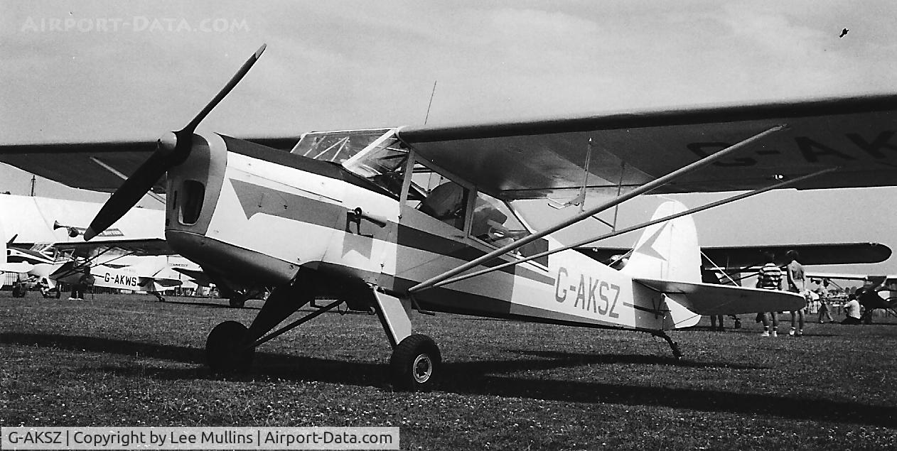 G-AKSZ, 1945 Taylorcraft J Auster 5 C/N 1503, Al & Dot Mathie's Auster 5C, which featured the engine mounts from a Miles Hawk Trainer. Here at Cranfield PFA Rally C1988.