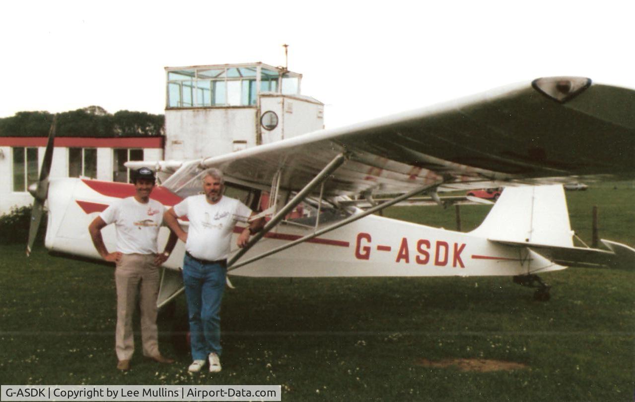 G-ASDK, 1962 Beagle A-61 Terrier 2 C/N B.702, Barry Dowsett & myself pose by the Terier I had restored a few years earlier. Sywell C1991.