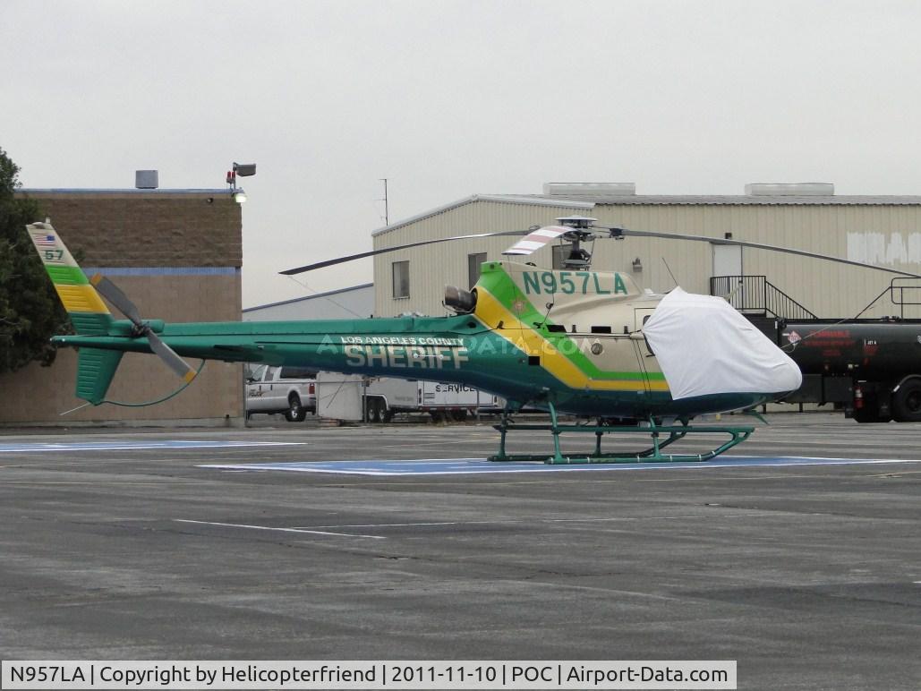 N957LA, 2010 Eurocopter AS-350B-2 Ecureuil Ecureuil C/N 7072, Parked at LA County Air Ops pad and covered up from the weather