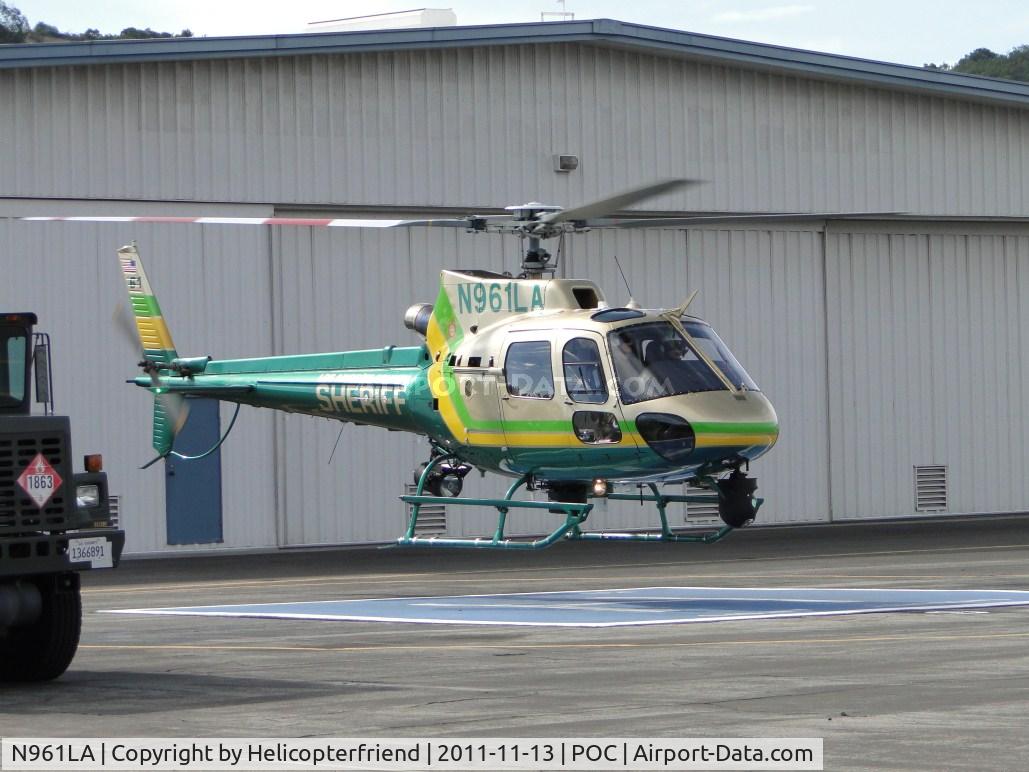 N961LA, 2011 Eurocopter AS-350B-2 Ecureuil Ecureuil C/N 7129, Setting down on helipad #5 next to fuel truck