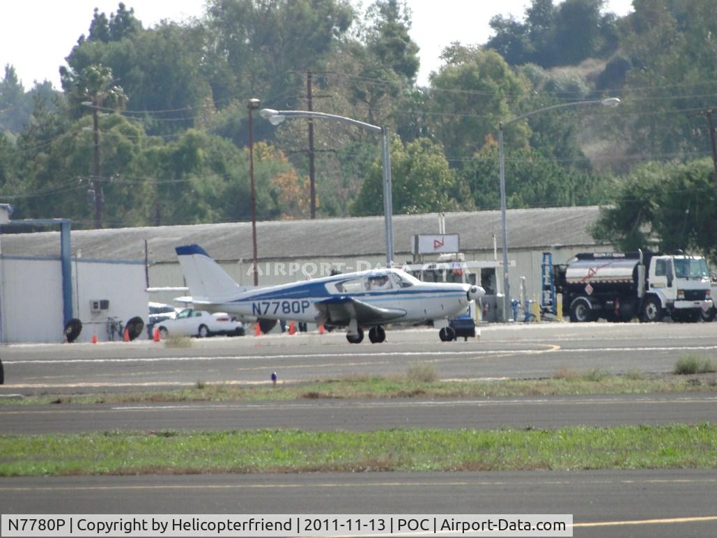 N7780P, 1961 Piper PA-24-250 Comanche C/N 24-2997, Rolling out on runway 26L
