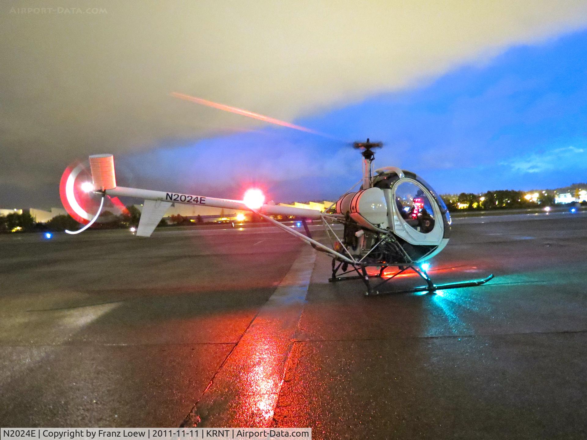 N2024E, 1996 Schweizer 269C C/N S1734, On the ramp at KRNT