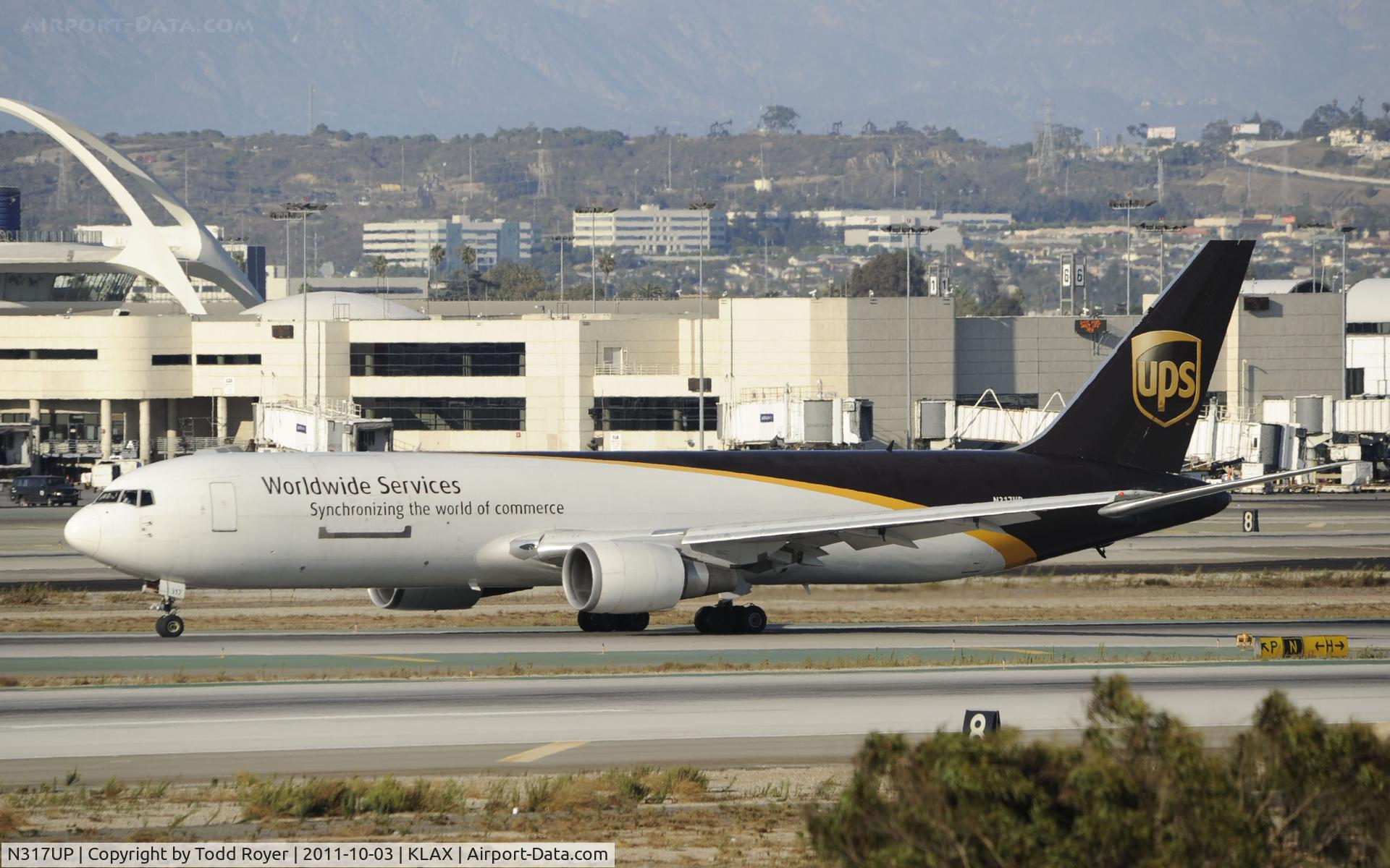 N317UP, 1997 Boeing 767-34AF C/N 27745, Arriving at LAX
