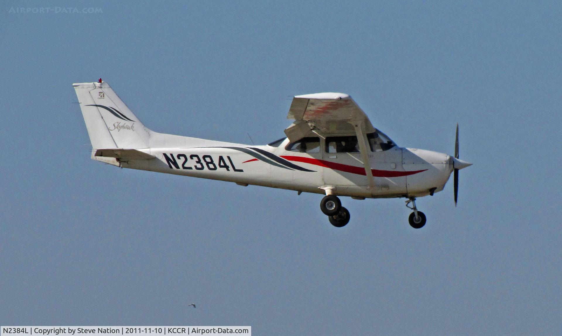 N2384L, 1999 Cessna 172R C/N 17280706, Locally-based Sterling Flight LLC 1999 Cessna 172R on approach to RWY 1L @ Concord, CA