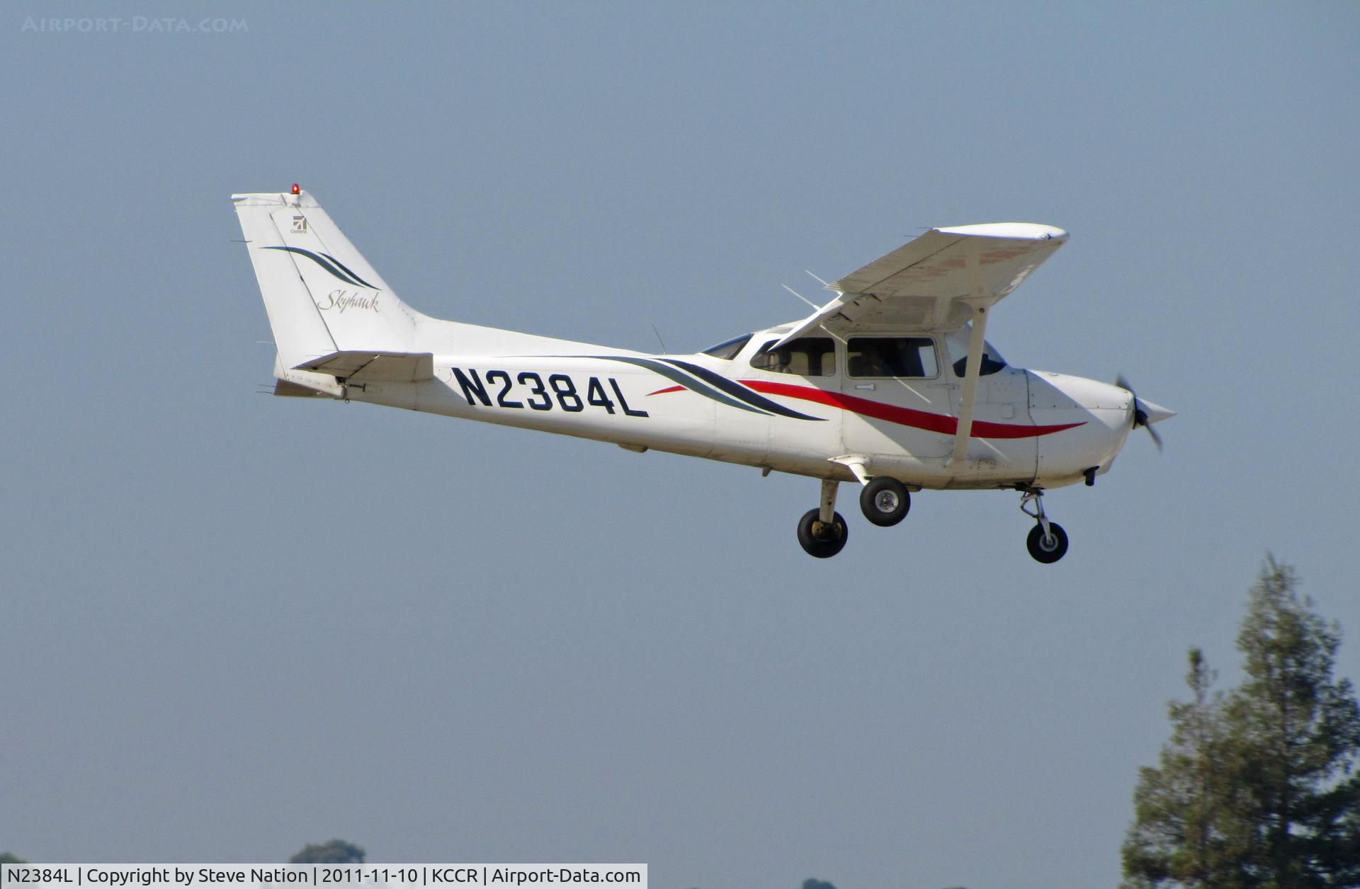 N2384L, 1999 Cessna 172R C/N 17280706, Locally-based Sterling Flight LLC 1999 Cessna 172R on approach to RWY 1L @ Concord, CA