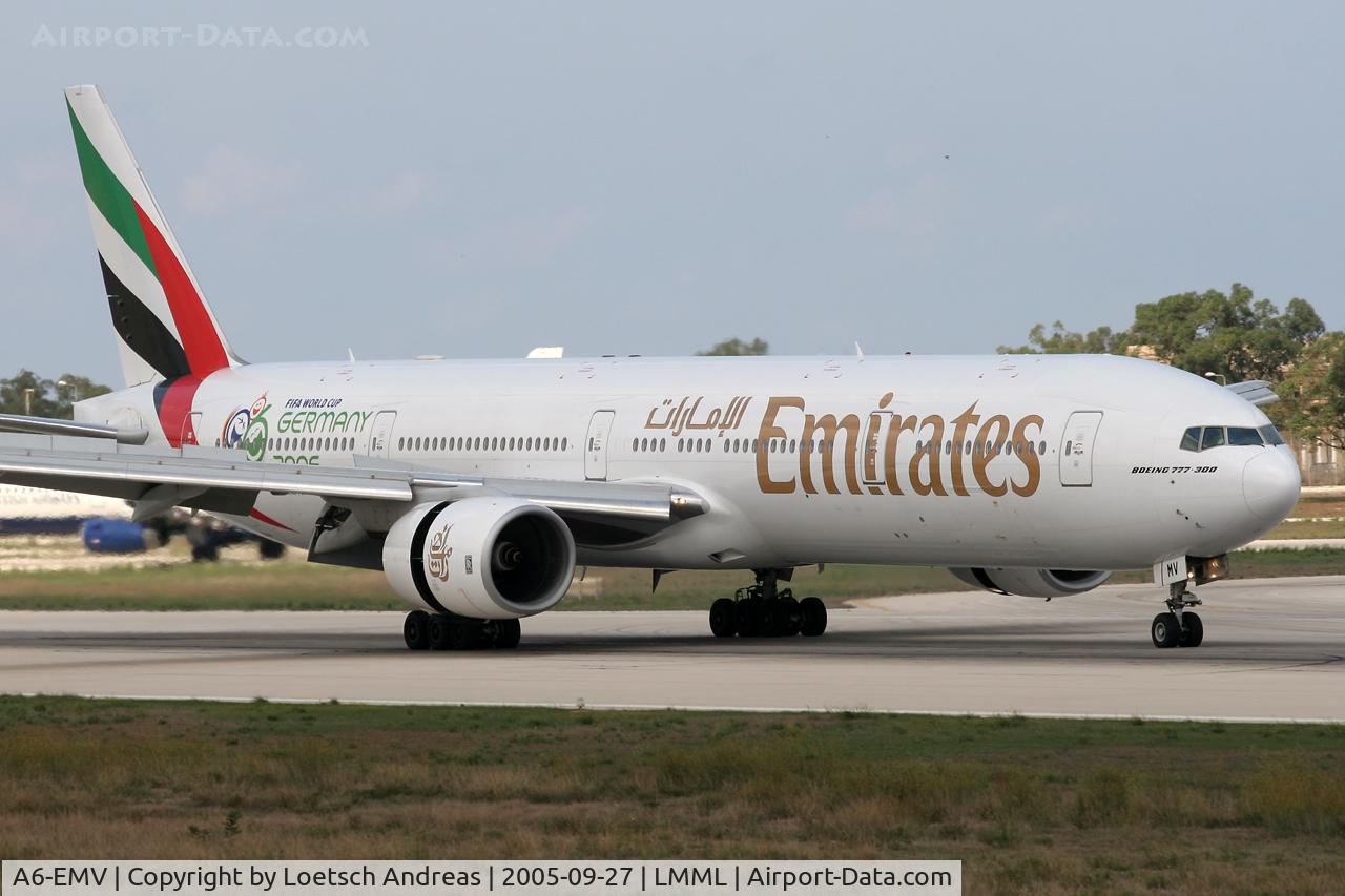 A6-EMV, 2003 Boeing 777-31H C/N 28687, landing
