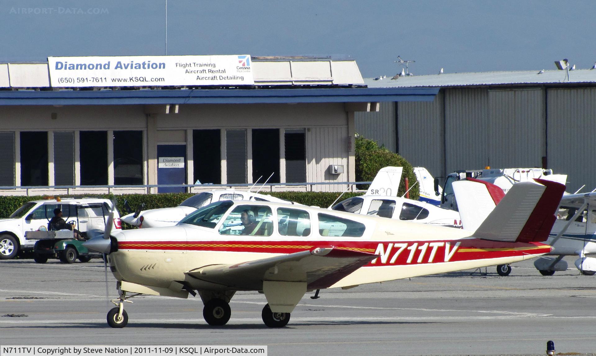 N711TV, 1965 Beech S35 Bonanza C/N D-7931, Locally-based 1965 Beech S35 Bonanza taxis at San carlos, CA