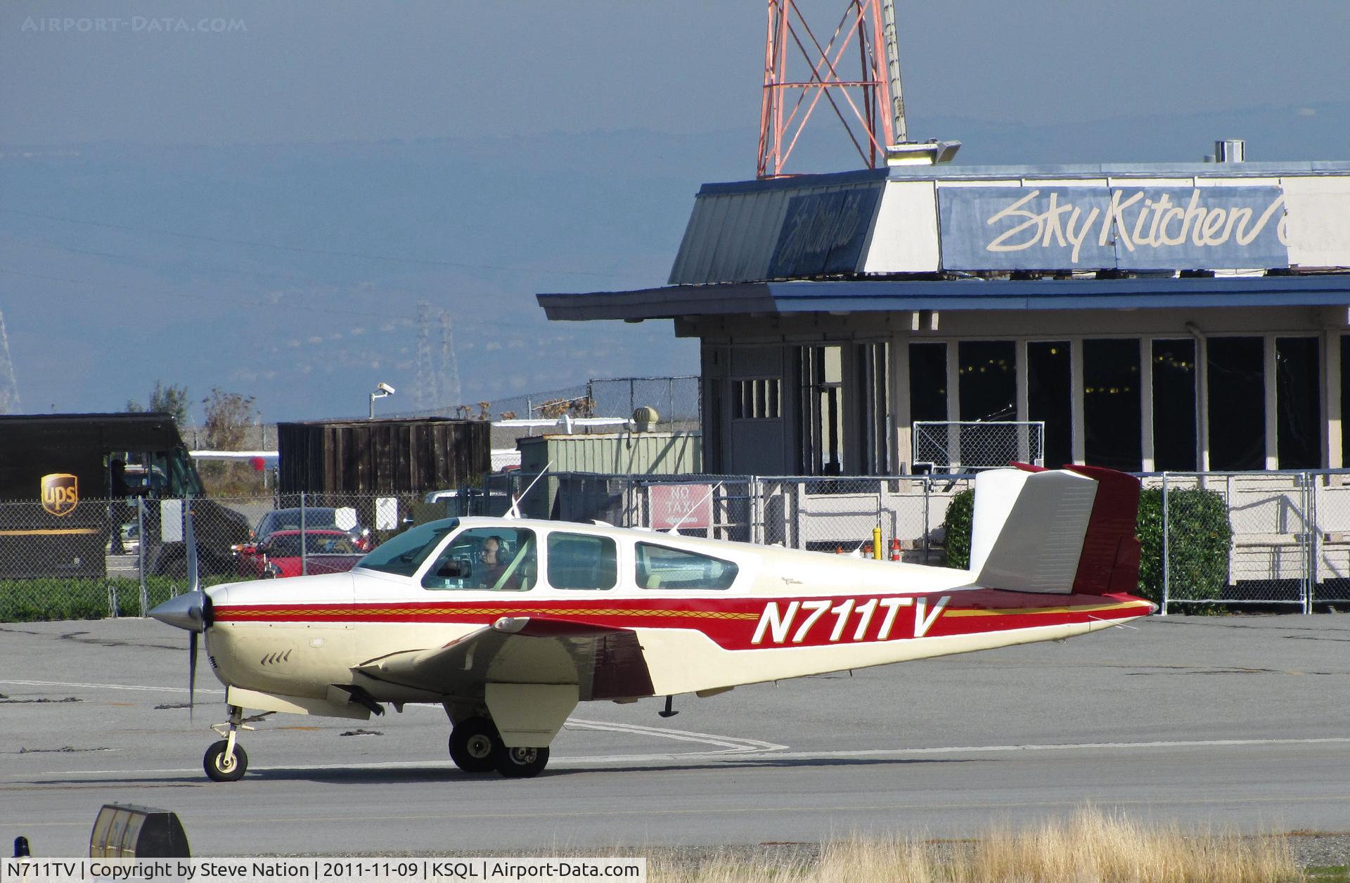 N711TV, 1965 Beech S35 Bonanza C/N D-7931, Locally-based 1965 Beech S35 Bonanza taxis at San carlos, CA