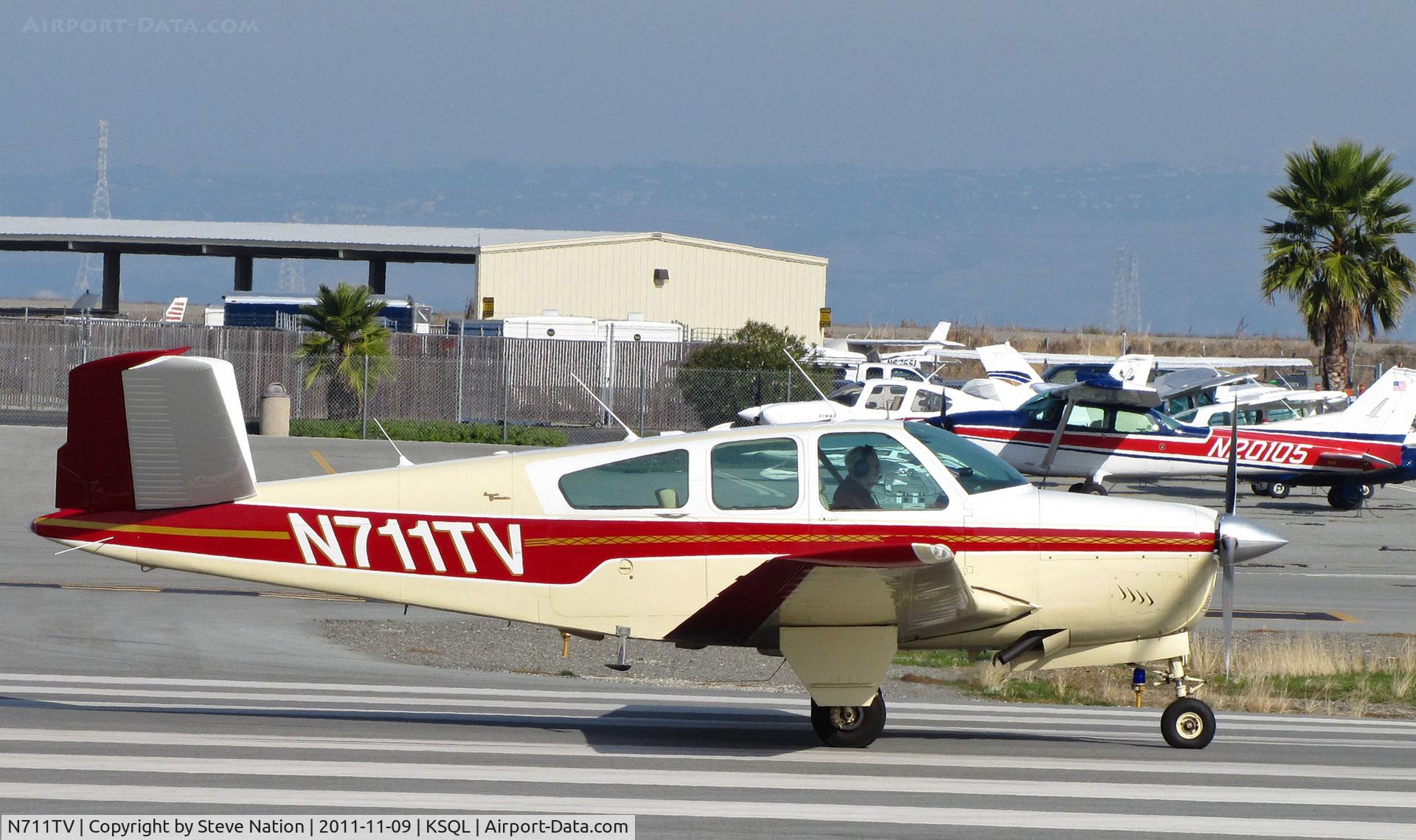 N711TV, 1965 Beech S35 Bonanza C/N D-7931, Locally-based 1965 Beech S35 Bonanza running-up engine at San Carlos, CA