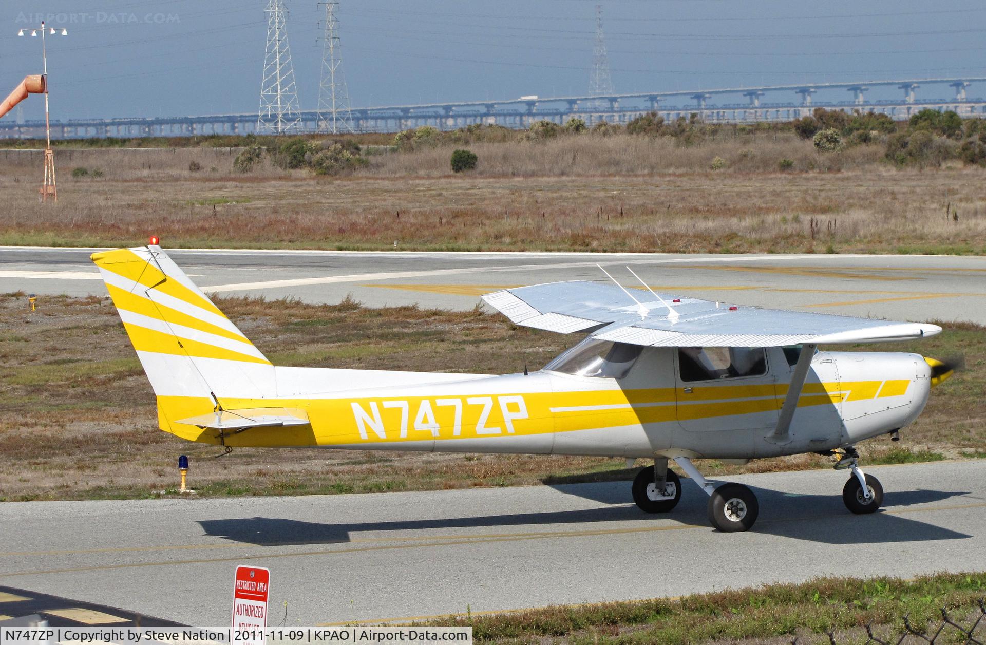 N747ZP, 1977 Cessna 152 C/N 15279476, Advantage Air (Palo Alto, CA) 1977 Cessna 152 taxis for take-off at KPAO