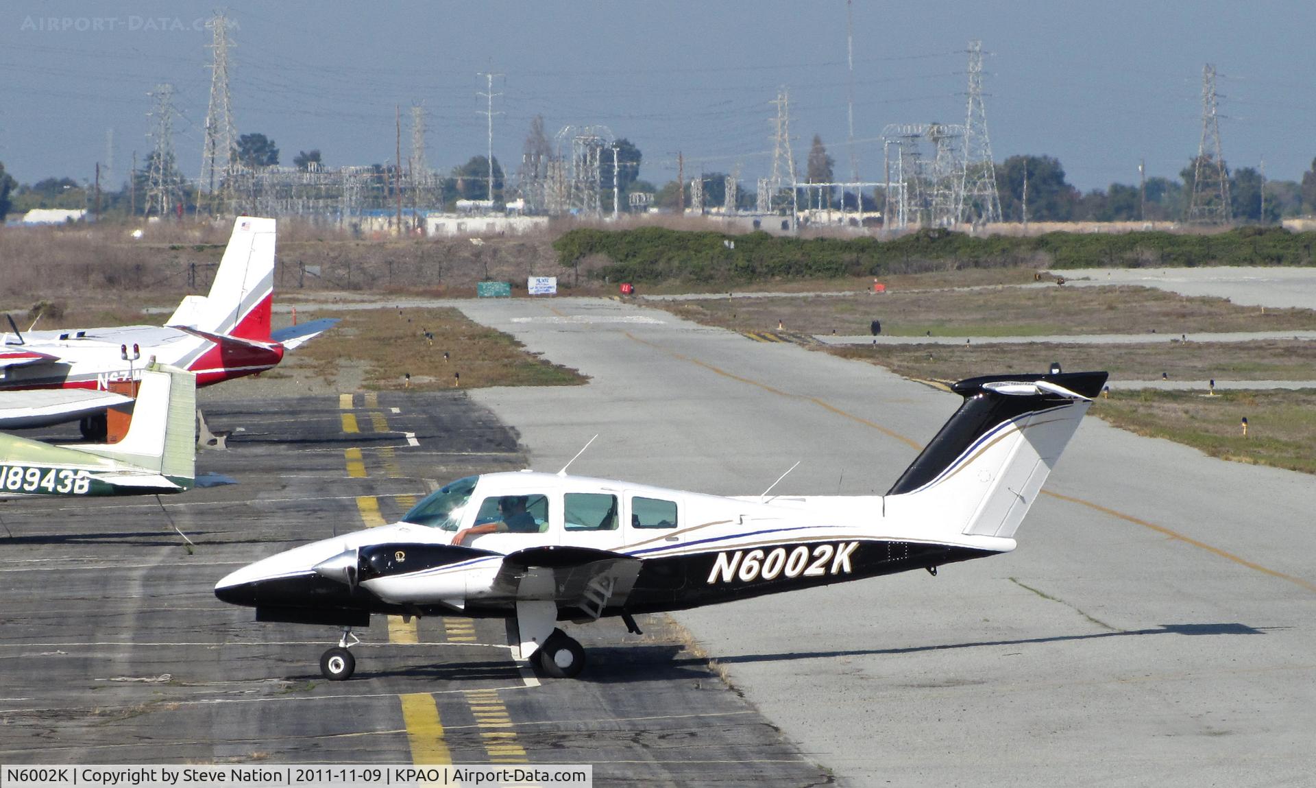 N6002K, 1978 Beech 76 Duchess C/N ME-122, Locally-based Hamilton Gast LLC (FAA says Round Rock, TX!) 1978 Beech 76 Duchess taxis to regular parking spot @ Palo Alto, CA