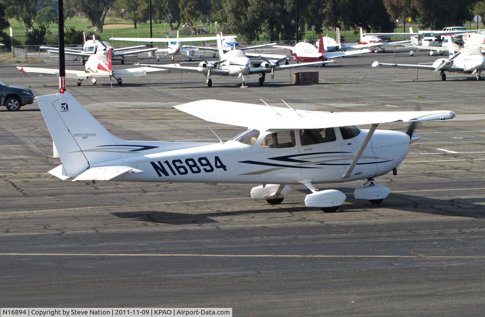 N16894, 2007 Cessna 172S C/N 172S10615, G Flux LLC (Sonoma, CA) 2002 Cessna 172S running-up engine at Palo Alto, CA
