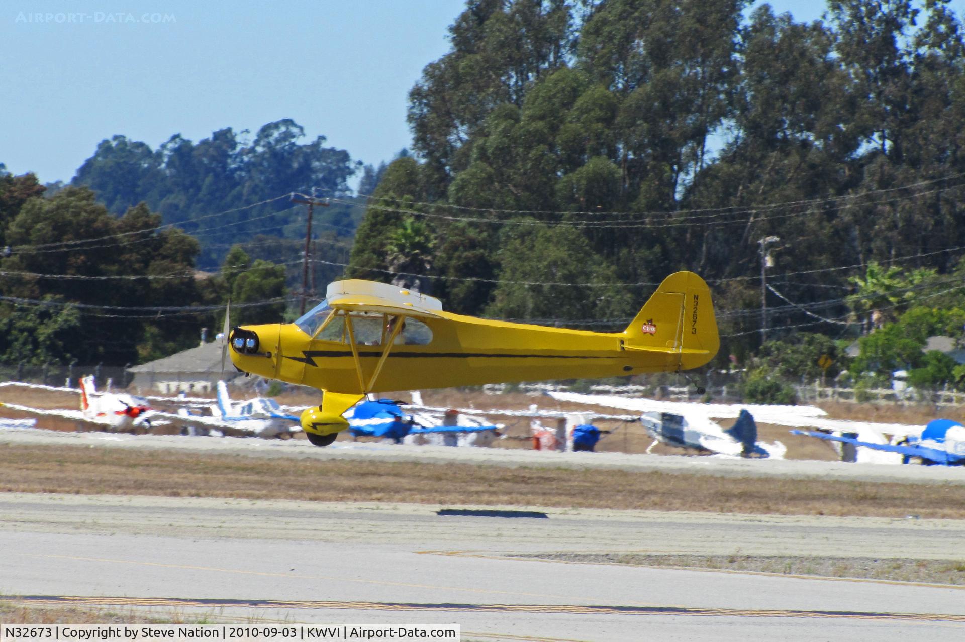 N32673, 1940 Piper J3C-65S Cub C/N 5532, 1940 Piper J3C-65S Cub landing @ Watsonville Fly-In