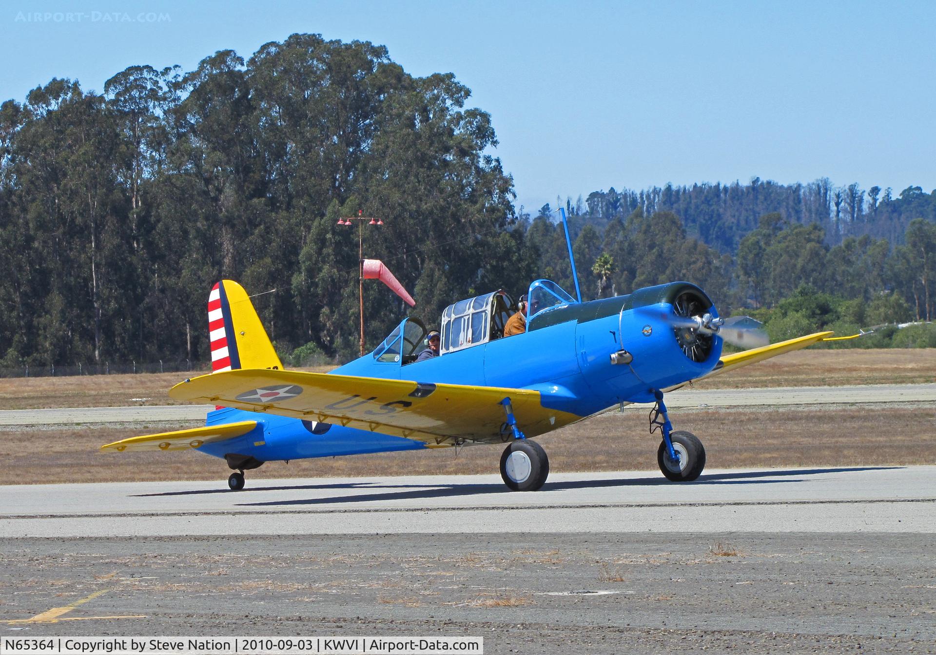 N65364, 1945 Convair BT-15 C/N 791216, Convair BT-15 (according to FAA register) painted as USAAC Vultee BT-13B 42-90259 and taxying @ Watsonville, CA Fly-In