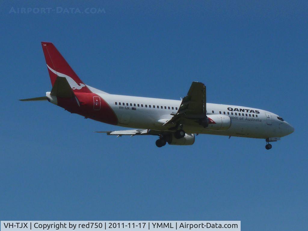 VH-TJX, 1995 Boeing 737-476 C/N 28150, Tango Juliet Xray approaching rwy 27 at MEL