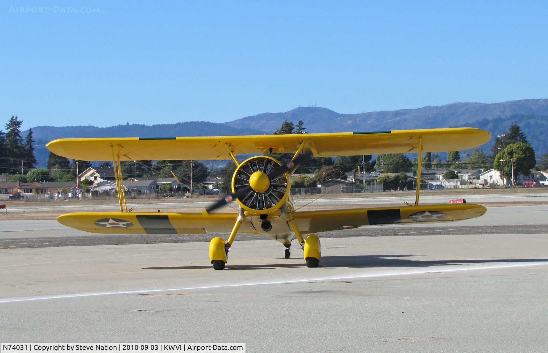 N74031, Boeing A75N1(PT17) C/N 75-3136, Boeing PT-17BW (USAAC 41-25629) painted as US Navy N2S 413 yellow cs and green band taxying (head on shot) @ Watsonville Fly-In