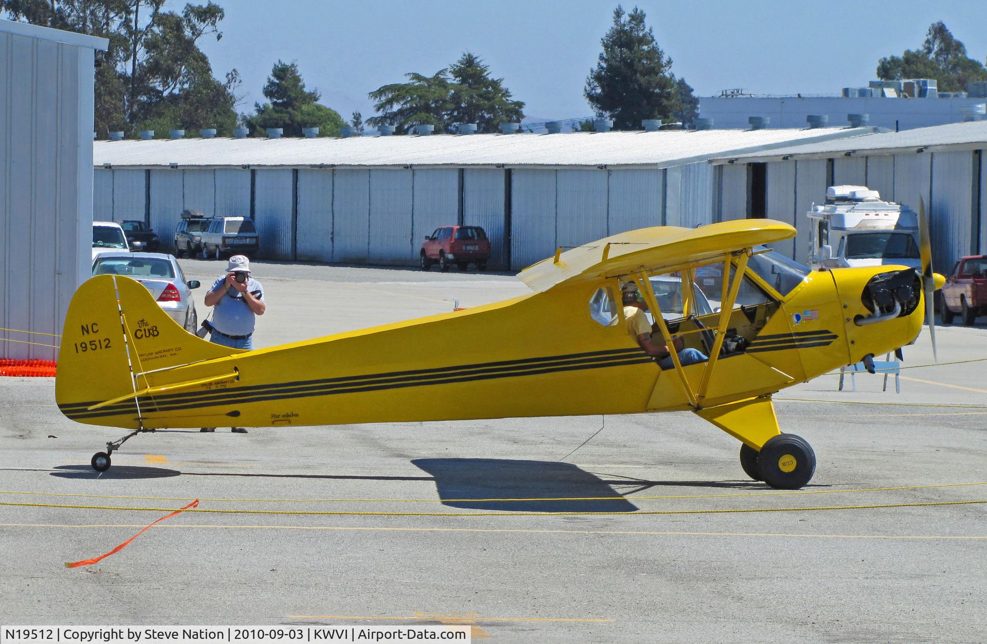 N19512, 1937 Taylor J-2 Cub C/N 1712, 1937 Taylor J-2 painted as NC19512 taxiing @ Watsonville Fly-In (spy vs spy or photographer vs photographer!?)
