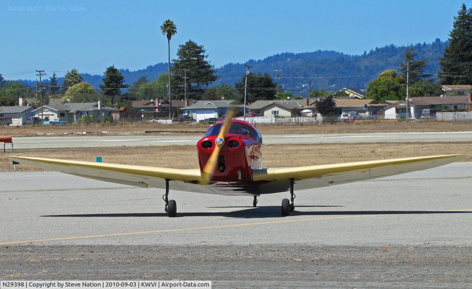 N29398, 1940 Culver LCA C/N 191, Bright red  and yellow 1940 Culver LCA painted as NC29398 and taxiing (near head on) @ Watsonville Fly-In