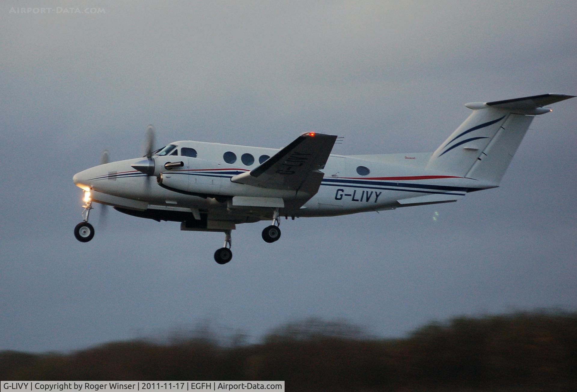 G-LIVY, 1977 Beech 200 Super King Air C/N BB-209, Dusk departure of Dragonfly Aviation Service's Super King Air.