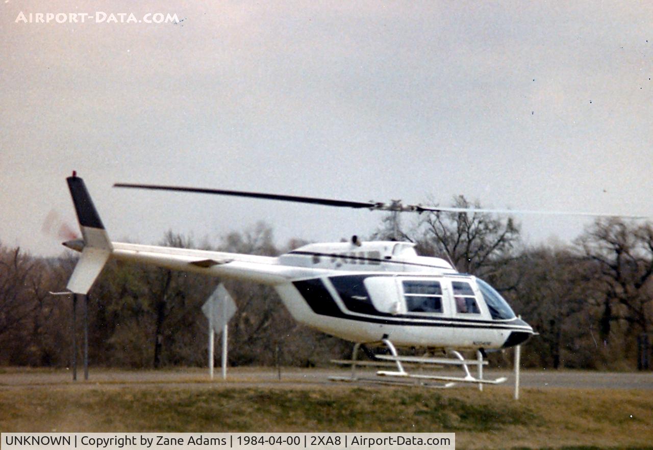 UNKNOWN, Helicopters Various C/N unknown, Bell 206 landing at Sam's Motel along I-45 near Farifield, TX