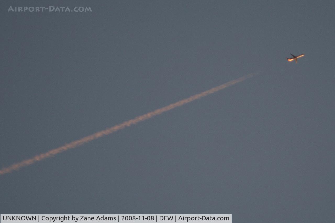 UNKNOWN, Contrails Various C/N Unknown, Flying high at sunset over DFW