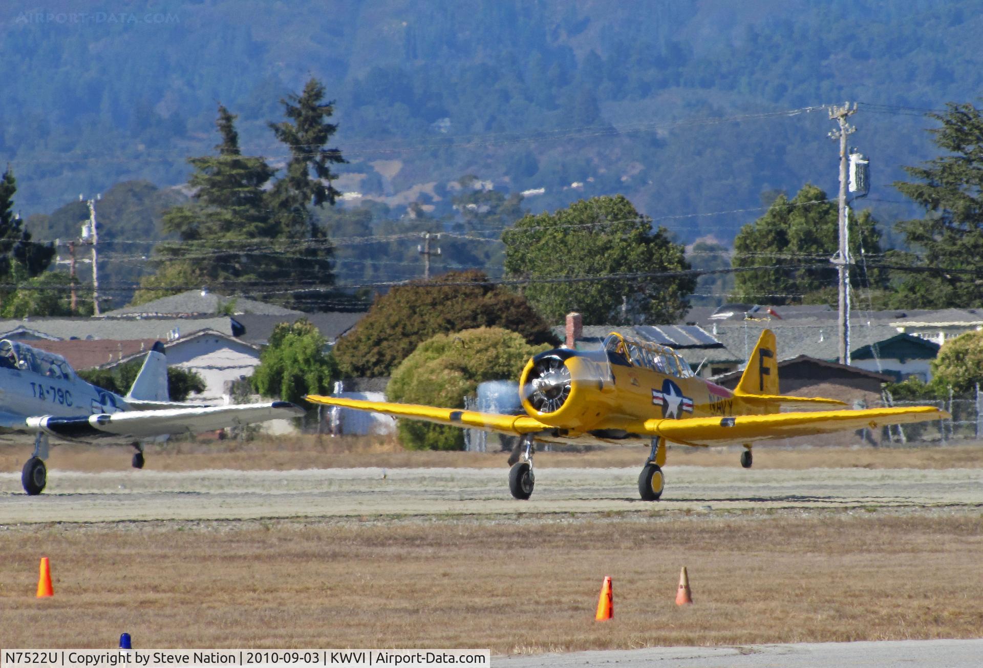 N7522U, 1952 Canadian Car & Foundry Harvard MK IV C/N CCF4-214, 2010 Watsonville Fly-In:AT-6D N6979C in USAF TA-079 colors and Harvard Mark IV N7522U in USN Oakland F/044 colors formation take-off