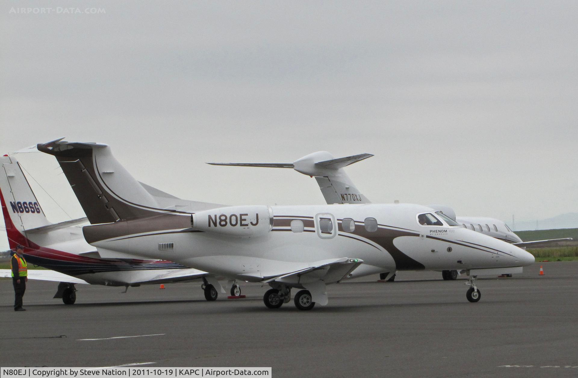 N80EJ, 2010 Embraer EMB-500 Phenom 100 C/N 50000133, Phen One LLC (Aventura, FL) 2010 EMB-500 taxiing for departure from Napa, CA