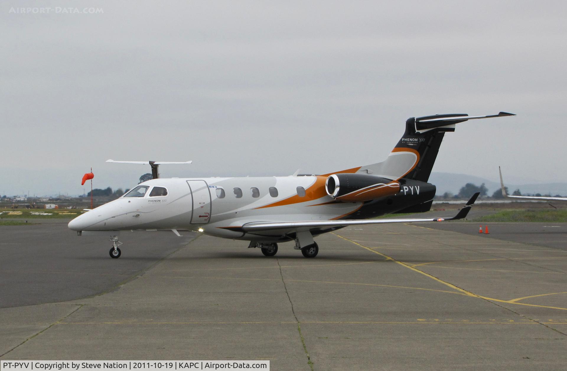 PT-PYV, 2011 Embraer EMB-505 Phenom 300 C/N 50500043, Embraer demo EMB-505 Phenom 300 taxiing @ Napa, CA