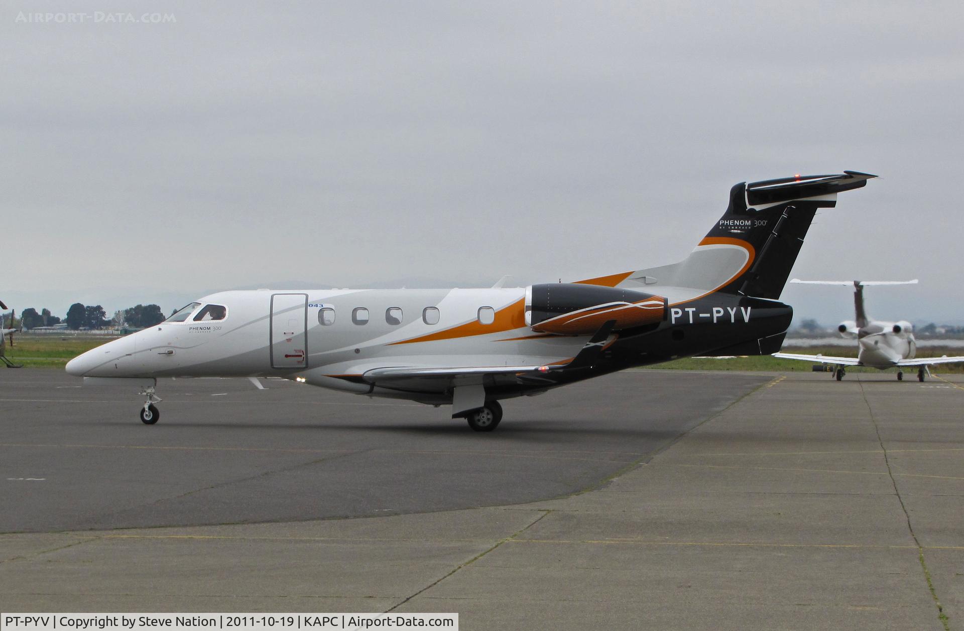 PT-PYV, 2011 Embraer EMB-505 Phenom 300 C/N 50500043, Embraer demo EMB-505 Phenom 300 taxiing @ Napa, CA