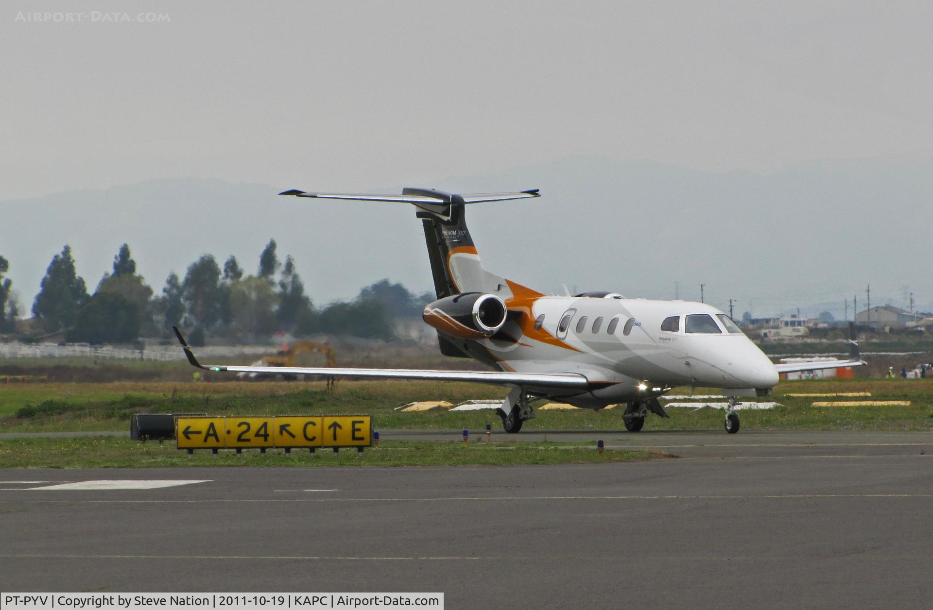 PT-PYV, 2011 Embraer EMB-505 Phenom 300 C/N 50500043, Embraer demo EMB-505 Phenom 300 taxiing @ Napa, CA