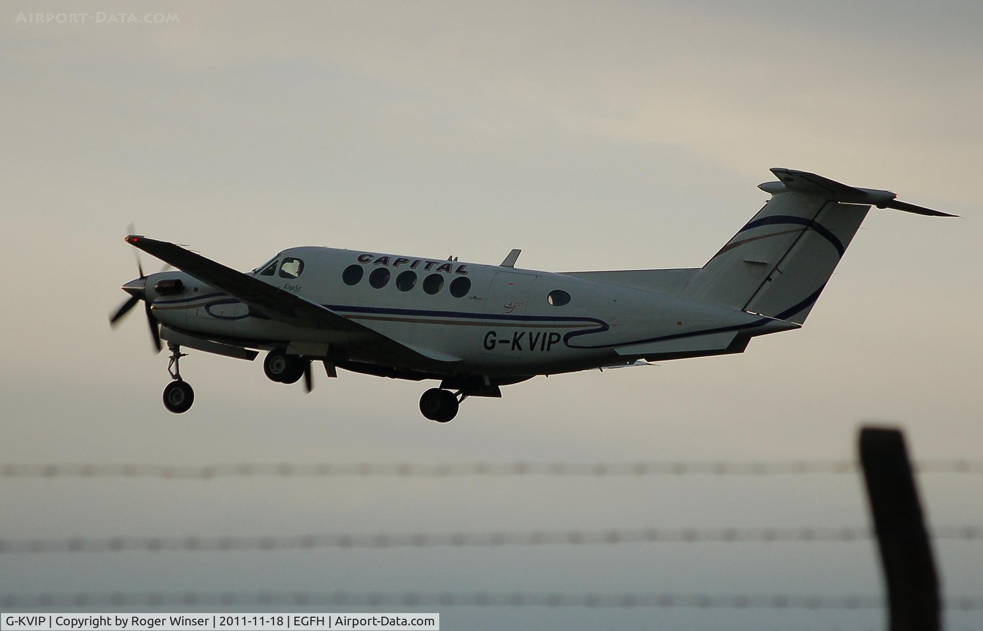 G-KVIP, 1979 Beech 200 Super King Air C/N BB-487, Dusk departure of Capital Air Charter's Super King Air