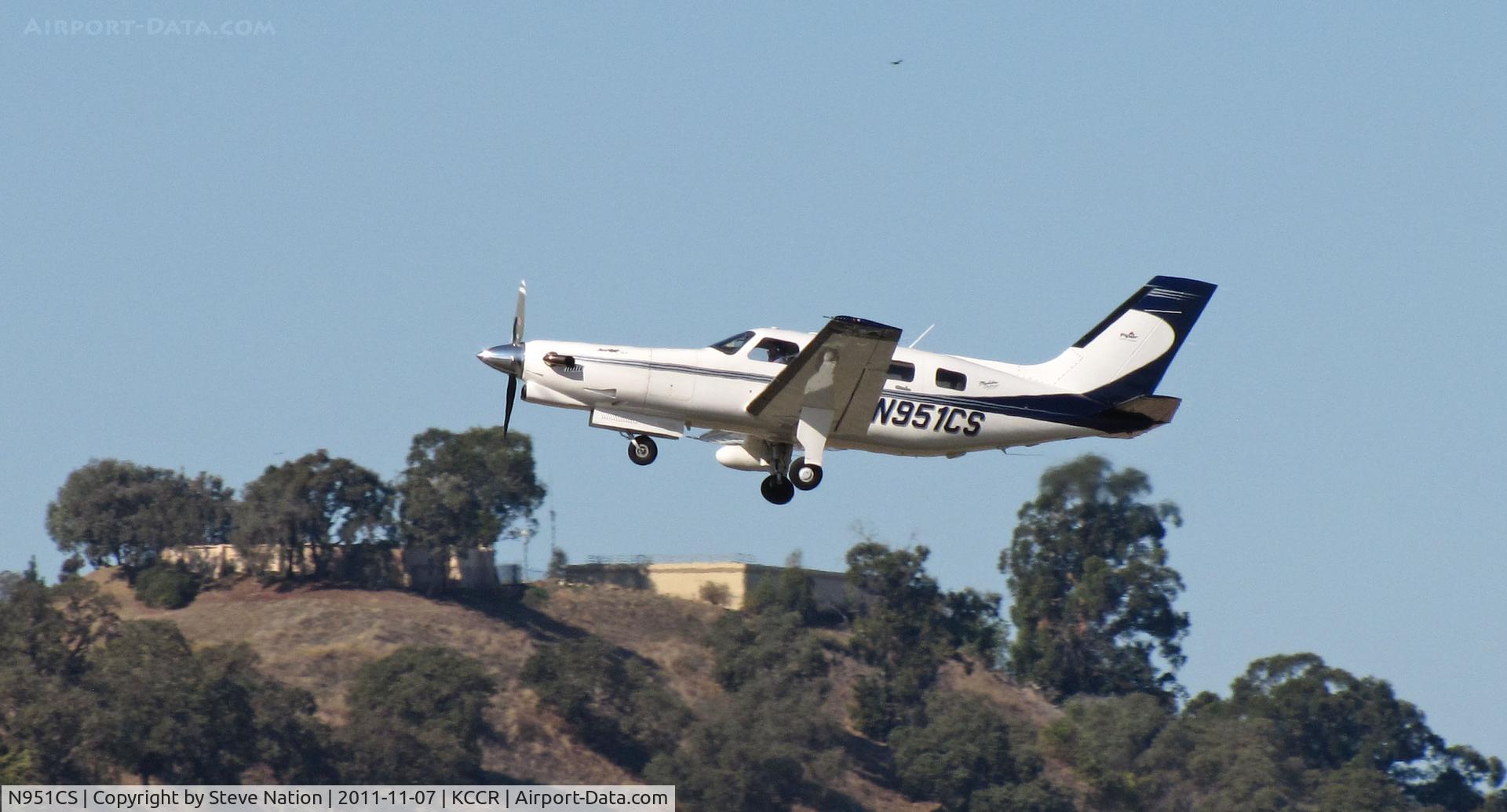 N951CS, 1999 Piper PA-46-350P Malibu Mirage C/N 4636212, Gear is retracting on Galloway Air (Charlotte, NC) 1999 PA-46-3560P as she climbs out from RWY 19R take-off at Buchanan Field