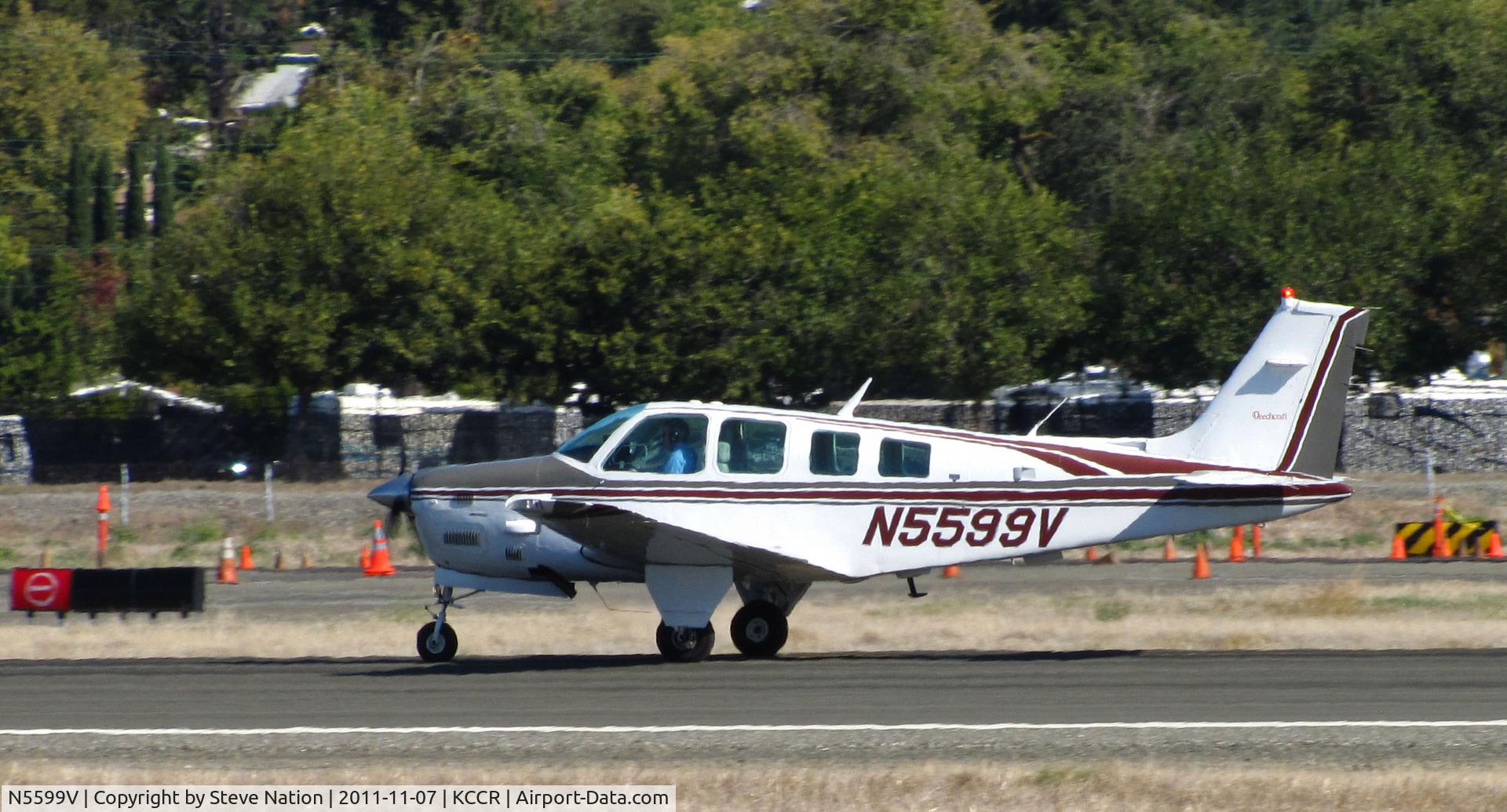 N5599V, 1989 Beech B36TC Bonanza C/N EA-500, 1989 Beech B36TC taking-off on RWY 32R at Buchanan Field