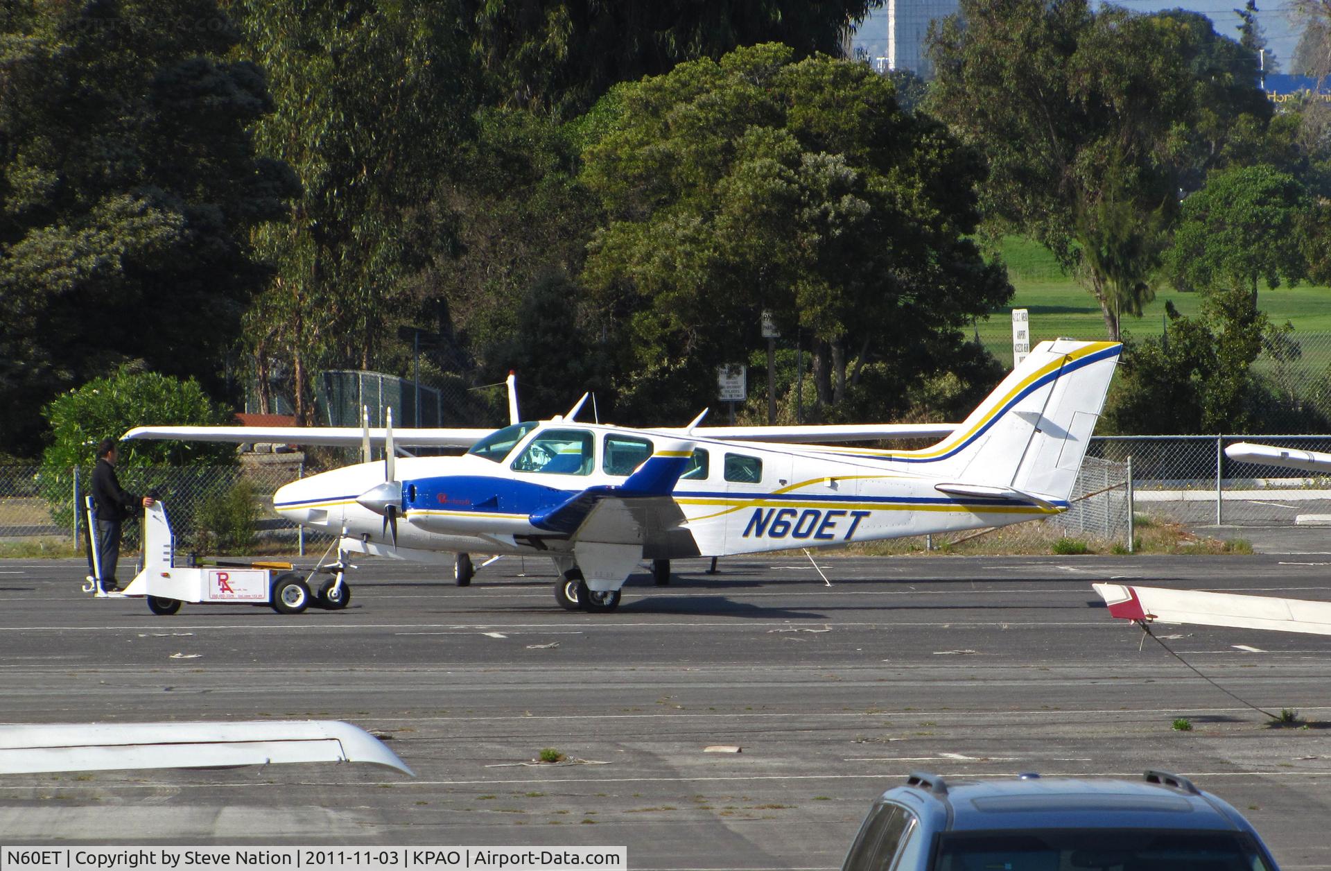 N60ET, 1977 Beech 58TC Baron C/N TK-57, 1999 Beech 58TC Baron with winglets being towed at Palo Alto, CA home base