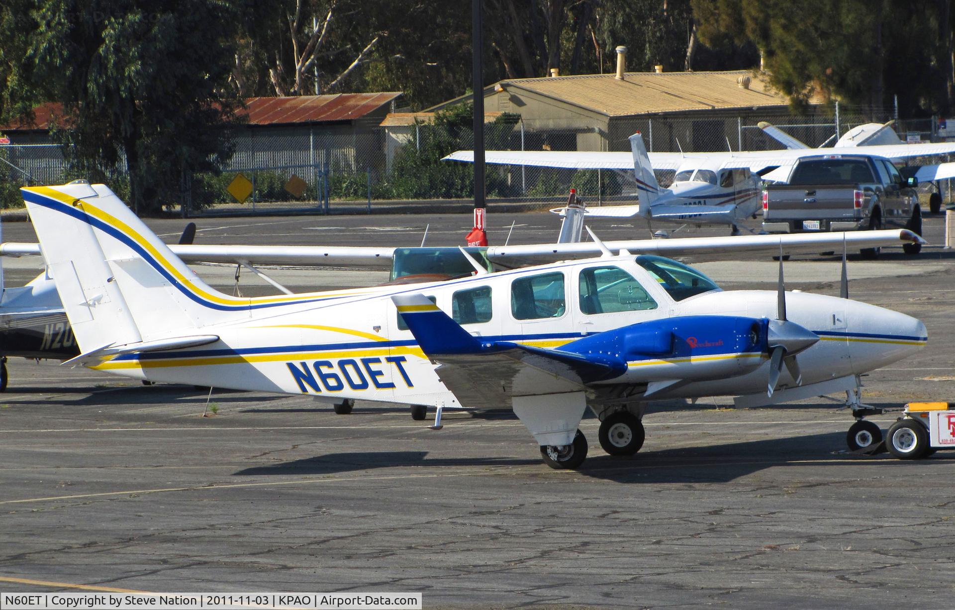 N60ET, 1977 Beech 58TC Baron C/N TK-57, 1999 Beech 58TC Baron with winglets being towed at Palo Alto, CA home base