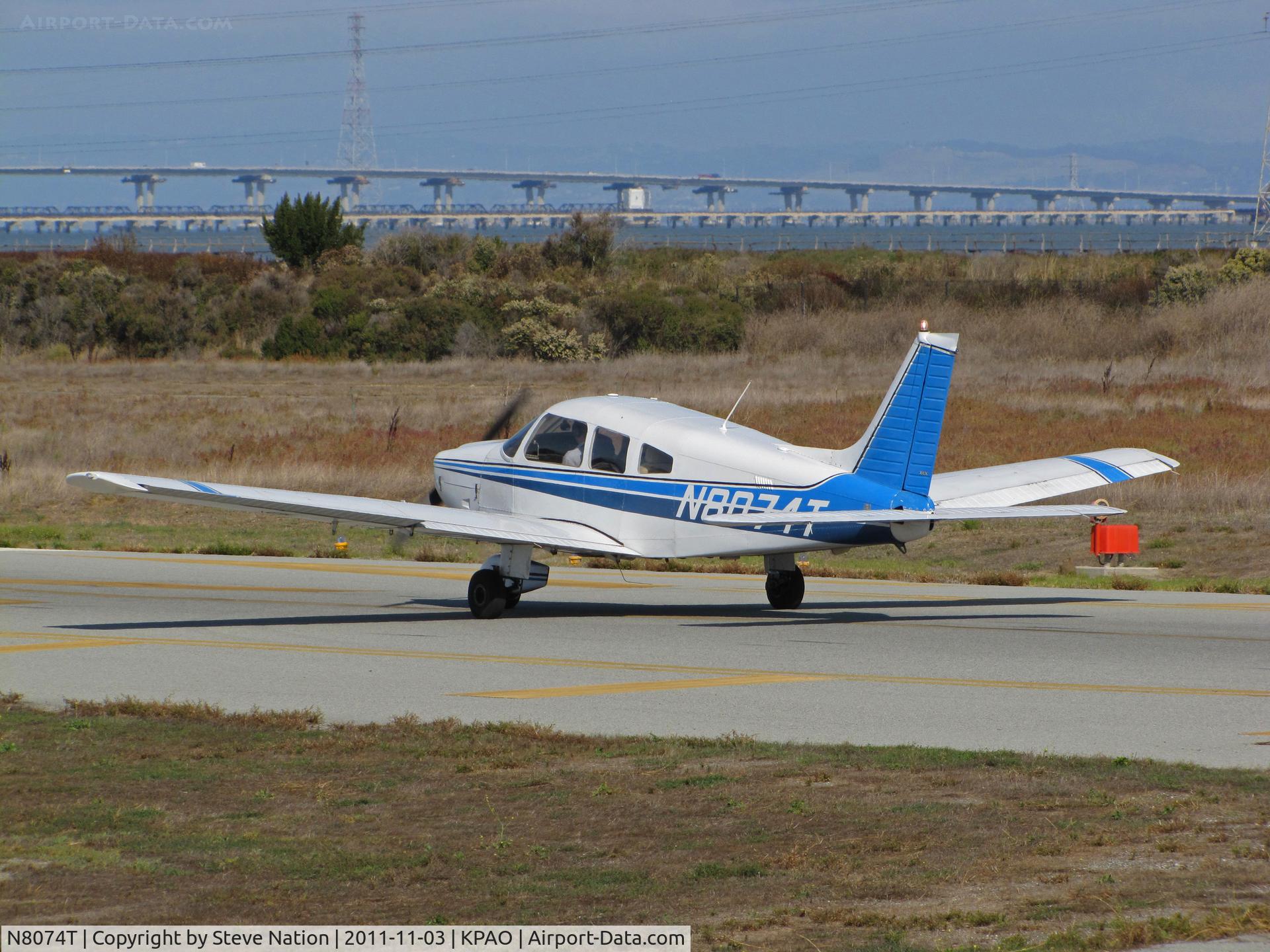 N8074T, 1979 Piper PA-28-181 Archer II C/N 28-8090062, Locally-based 1979 Piper PA-28-181 Cherokee ready for take-off (Dumbarton Bridge in background) at Palo Alto, CA