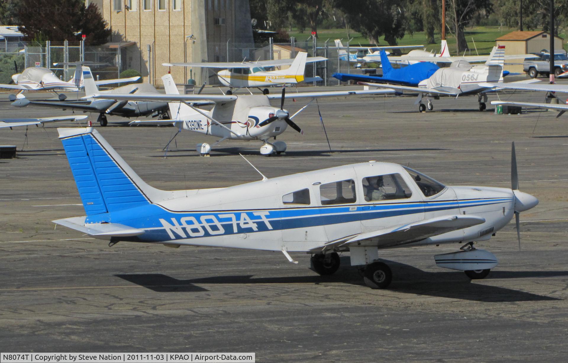 N8074T, 1979 Piper PA-28-181 Archer II C/N 28-8090062, Locally-based 1979 Piper PA-28-181 Cherokee running up engine and doing checks prior to take-off at Palo Alto, CA