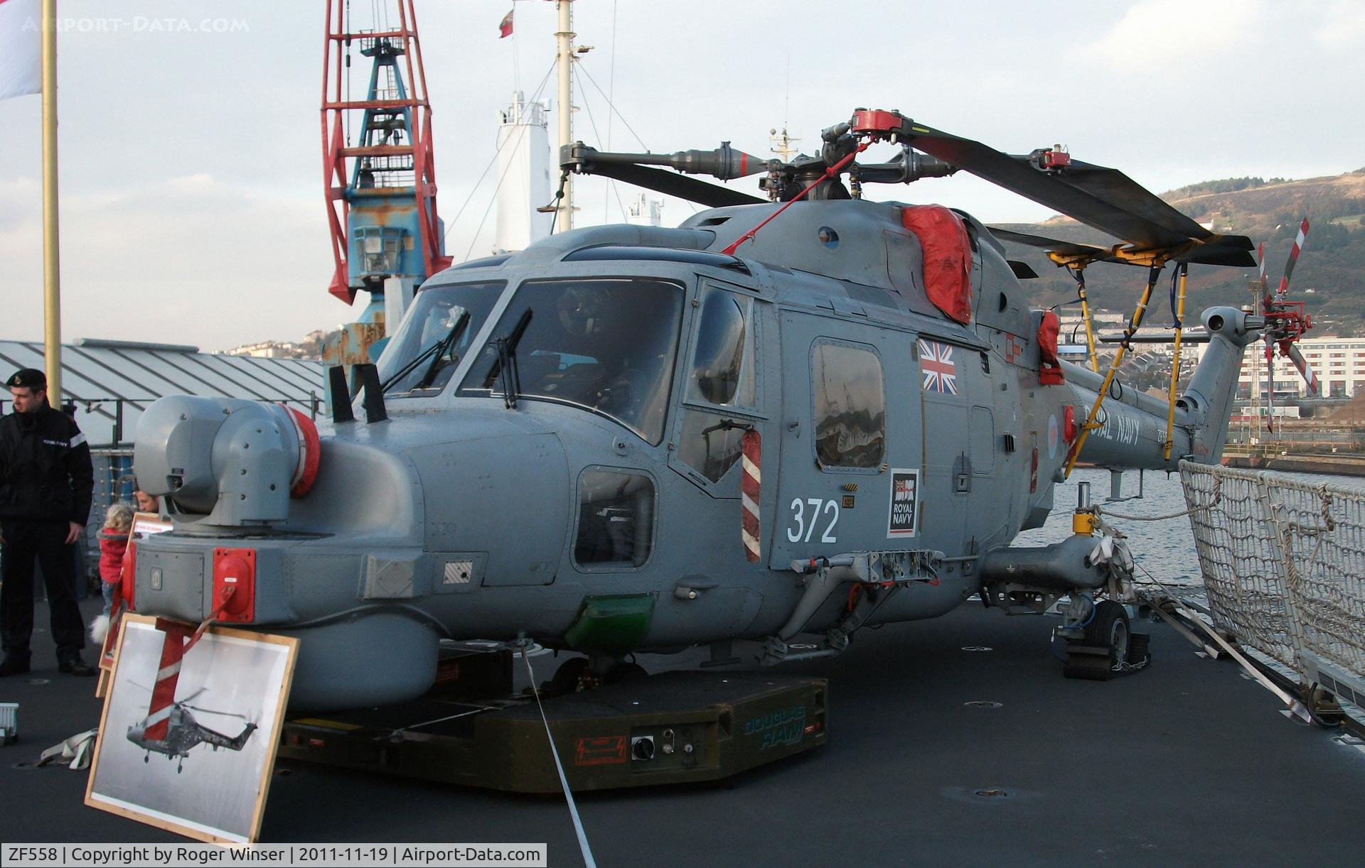 ZF558, 1987 Westland Lynx HMA.8SRU C/N 335, Off airport. Coded 372 of 815 NAS. Seen on the flight deck of HMS Diamond during the ship's visit to Swansea.