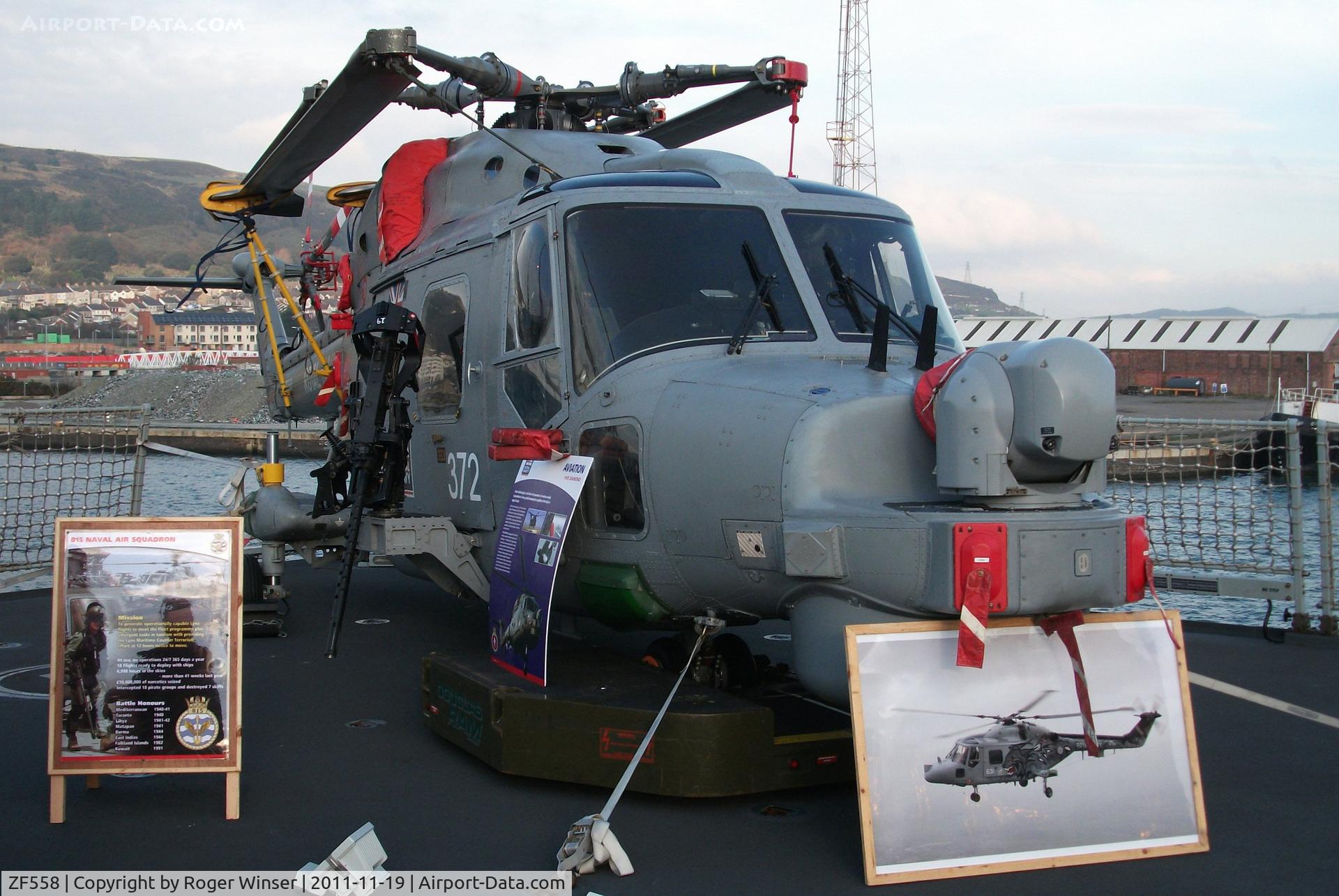 ZF558, 1987 Westland Lynx HMA.8SRU C/N 335, Off airport. Coded 372 of 815 NAS. Seen on the flight deck of HMS Diamond during the ship's visit to Swansea.
