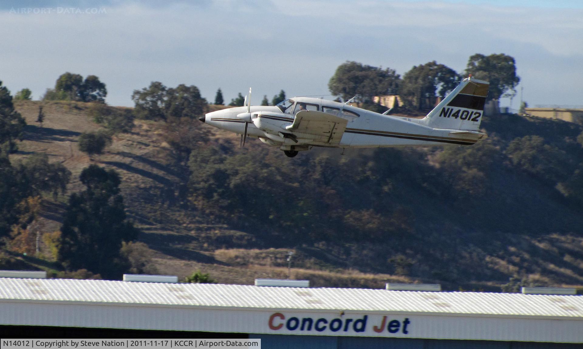 N14012, 1971 Piper PA-23-250 Aztec C/N 27-4629, Ja-Mar Industries (Santa Clara, CA) 1971 Piper PA-23-250 Aztec climbs out from RWY 19R - gear up - at Buchanan Field